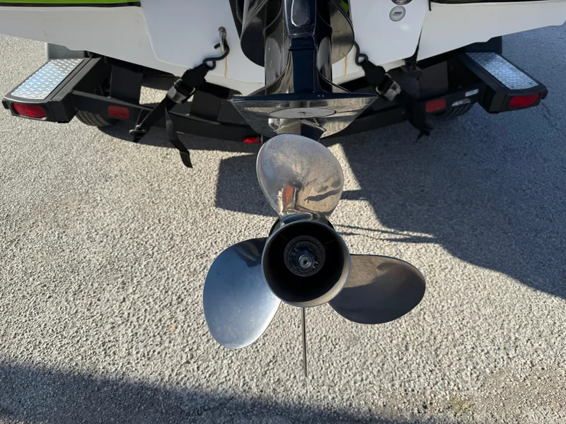 Slide: The Image of Close-up of a 2020 Tahoe 2150 CC boat propeller on a trailer. - 8