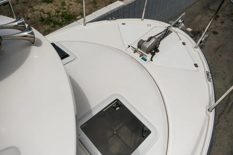 Slide: The Image of 2018 Ranger Tugs R-23 boat deck with anchor and hatches. - 17