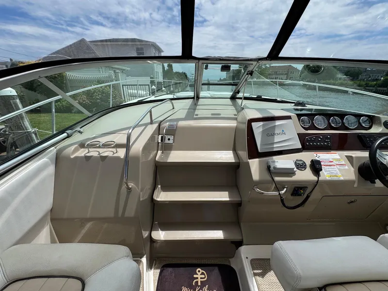 Slide: The Image of Interior view of 2008 Sea Ray 350 Sundancer boat cockpit with Garmin navigation system. - 14