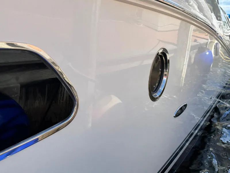 Slide: The Image of Side view of a 2008 Sea Ray 350 Sundancer yacht on water. - 18