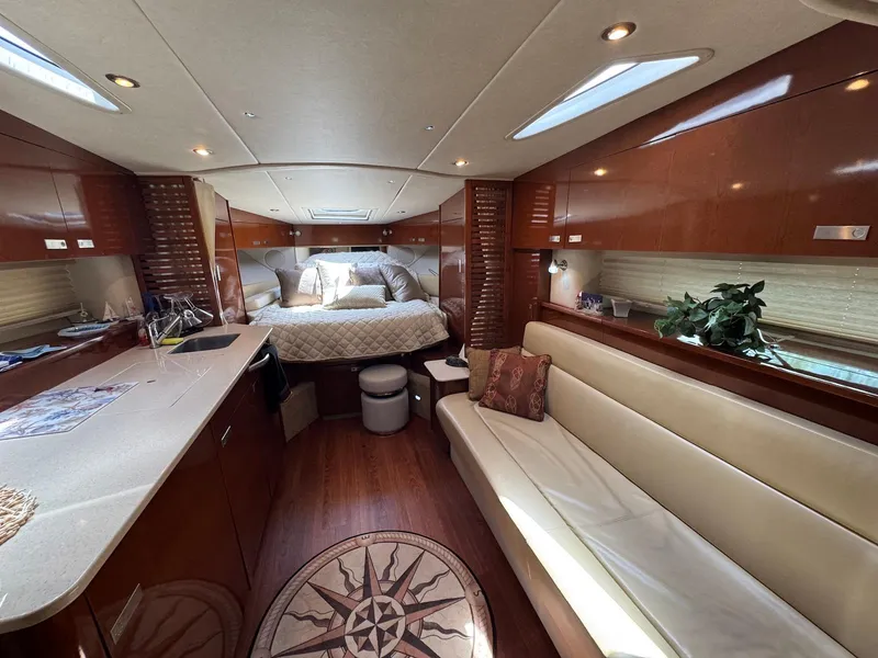 Slide: The Image of Luxurious interior of 2008 Sea Ray 350 Sundancer yacht with cozy seating and elegant decor. - 25