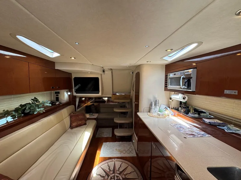 Slide: The Image of Luxurious interior of a 2008 Sea Ray 350 Sundancer yacht with modern amenities. - 29