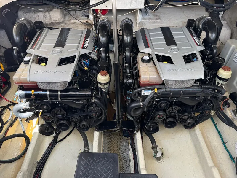 Slide: The Image of Twin MerCruiser engines in a 2008 Sea Ray 350 Sundancer boat engine compartment. - 35