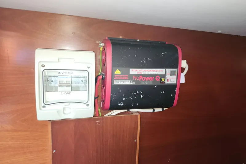 Slide: The Image of Electrical panel and inverter on a 2003 Beneteau 50 yacht interior. - 22