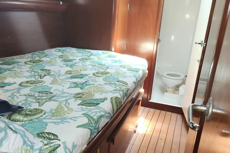Slide: The Image of Cozy cabin interior of 2003 Beneteau 50 yacht with ensuite bathroom. - 34