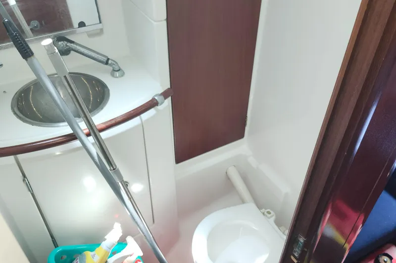 Slide: The Image of Bathroom interior of 2003 Beneteau 50 yacht with sink and toilet. - 35