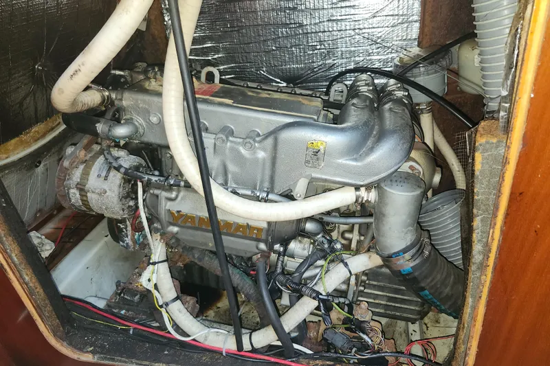 Slide: The Image of Engine compartment of a 2003 Beneteau 50 sailboat with Yanmar engine. - 41
