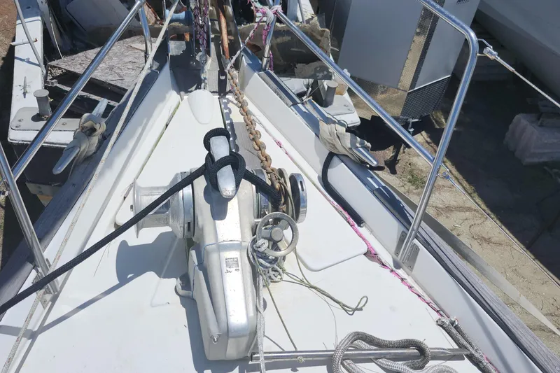Slide: The Image of Deck of 2003 Beneteau 50 sailboat with anchor chain and winch system. - 7