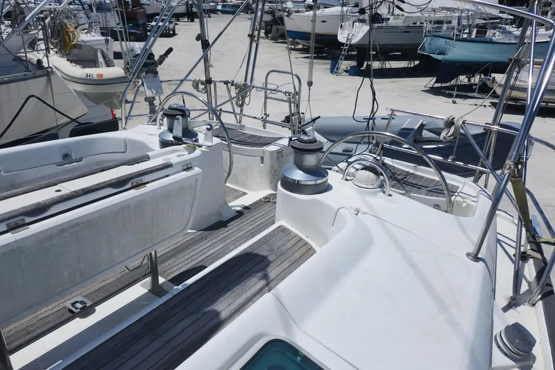 Slide: The Image of Cockpit of 2003 Beneteau 50 sailboat with steering wheel and winches. - 9