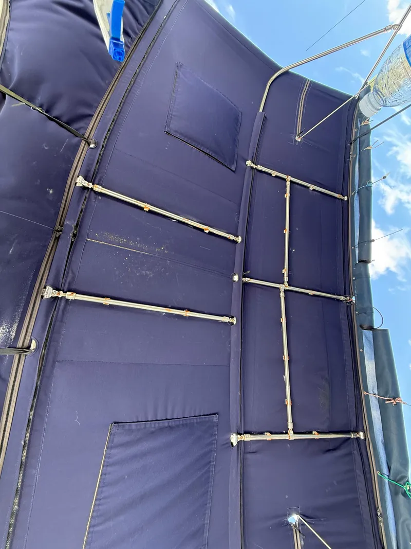 Slide: The Image of Blue sail canopy on a 2016 Beneteau Oceanis 45 yacht, viewed from below. - 32