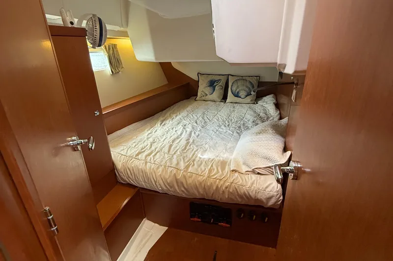 Slide: The Image of Cozy cabin interior of 2016 Beneteau Oceanis 45 yacht with comfortable bedding. - 39