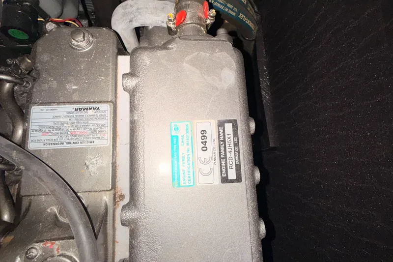 Slide: The Image of Engine compartment of a 2016 Beneteau Oceanis 45 sailboat, featuring a Yanmar engine. - 48