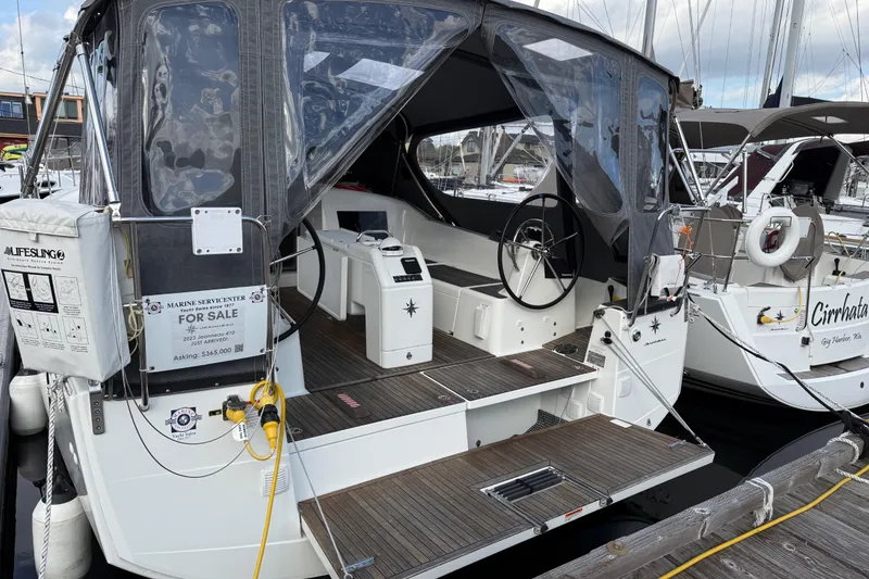 Slide: The Image of 2023 Jeanneau Sun Odyssey 410 sailboat for sale, docked with covered cockpit. - 29