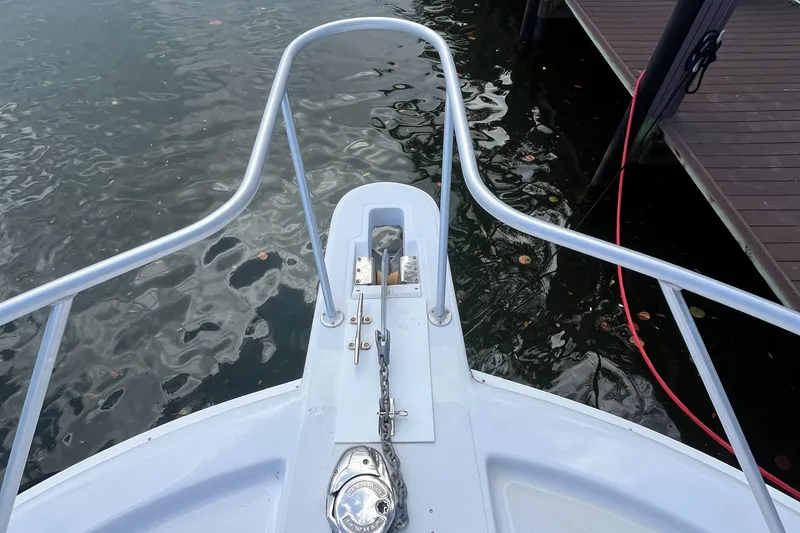 Slide: The Image of Bow view of 2000 Luhrs Tournament 360 Convertible boat at dock. - 15
