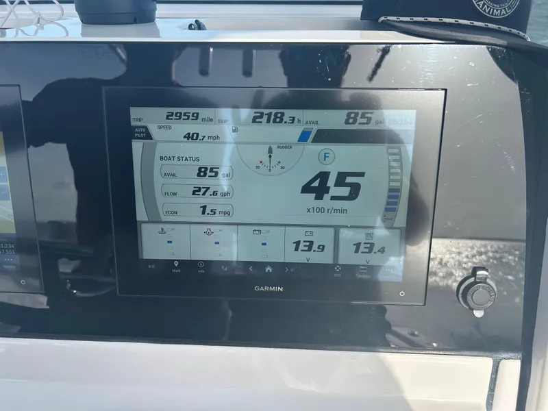 Slide: The Image of 2023 Sportsman Masters 267OE Bay Boat dashboard displaying speed, fuel, and engine data. - 11