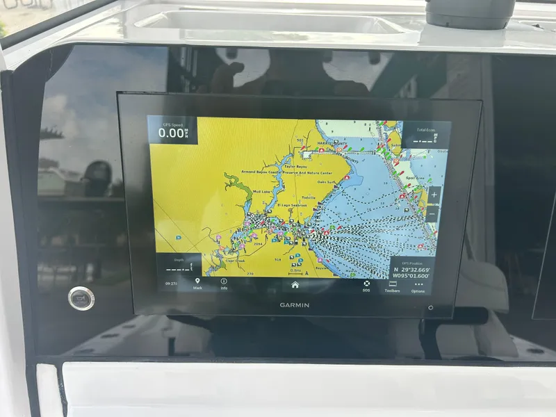 Slide: The Image of Garmin GPS display on 2023 Sportsman Masters 267OE Bay Boat, showing detailed nautical map. - 39