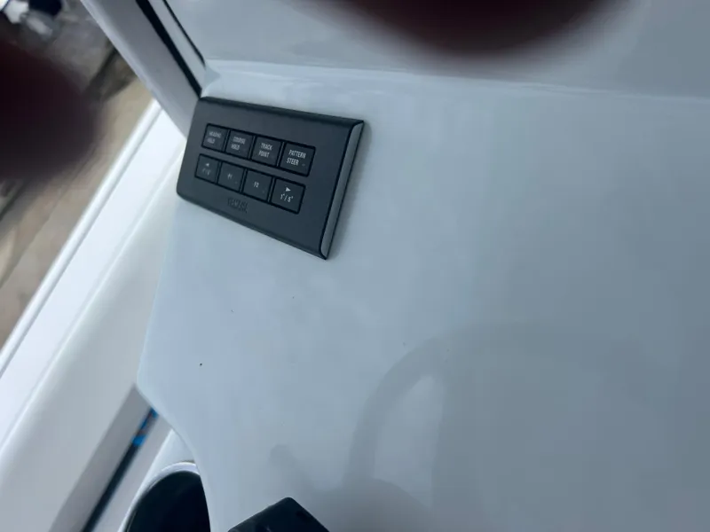 Slide: The Image of Control panel on 2023 Sportsman Masters 267OE Bay Boat dashboard. - 44