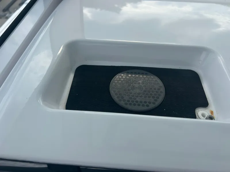 Slide: The Image of 2023 Sportsman Masters 267OE Bay Boat deck detail with circular drain feature. - 47