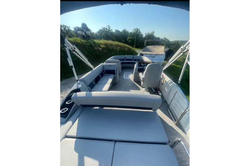 Slide: The Image of 2022 Bennington 23 LSB pontoon boat interior with spacious seating and modern design. - 13