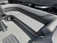 Slide: The Image of 2025 Bennington 25 SXSR boat interior with sleek gray seating and modern design. - 15