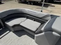 Slide: The Image of 2025 Bennington 25 SXSR boat interior with gray seating and modern design. - 16