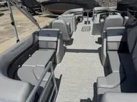 Slide: The Image of 2025 Bennington 25 SXSR pontoon boat with spacious seating and modern design. - 19