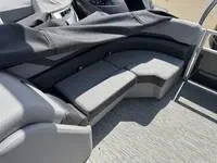Slide: The Image of 2025 Bennington 25 SXSR boat interior with gray seating and sleek design. - 21