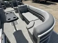 Slide: The Image of 2025 Bennington 25 SXSR pontoon boat with spacious seating and modern design. - 8