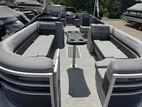 Slide: The Image of 2025 Bennington 25 SXSR pontoon boat with spacious seating and modern design. - 9