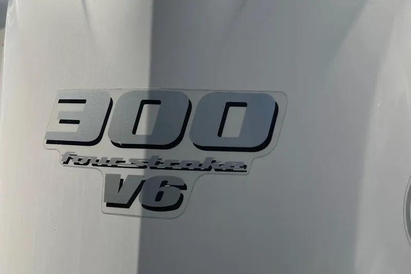 Slide: The Image of 300 horsepower V6 four-stroke engine decal on 2020 ShearWater 270 Carolina Flare. - 6