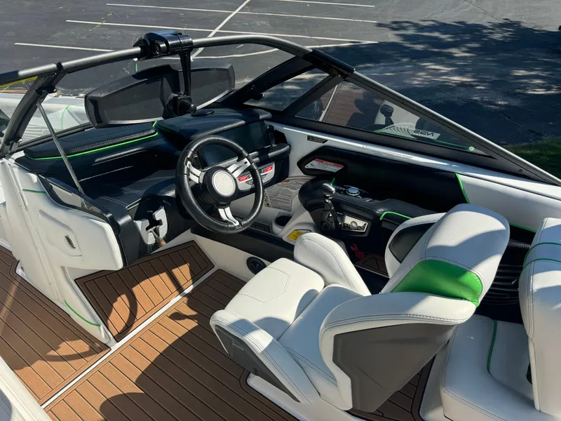 Slide: The Image of Interior of a 2017 Nautique Super Air Nautique G25 boat with modern design. - 8