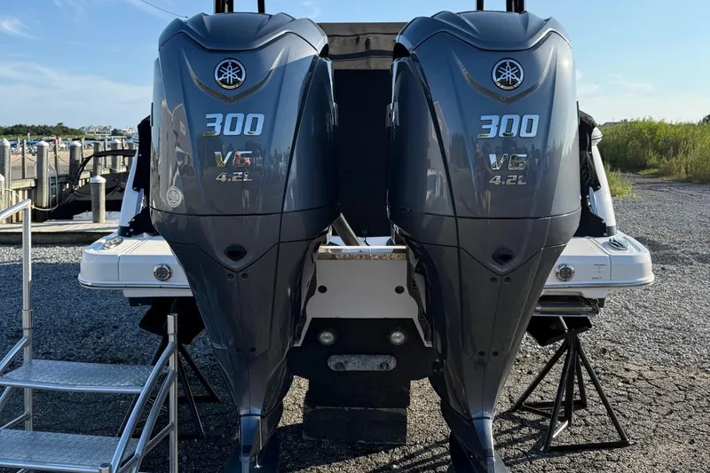Slide: The Image of Twin Yamaha 300 V6 outboard engines on a 2021 Chaparral 300 OSX boat. - 4