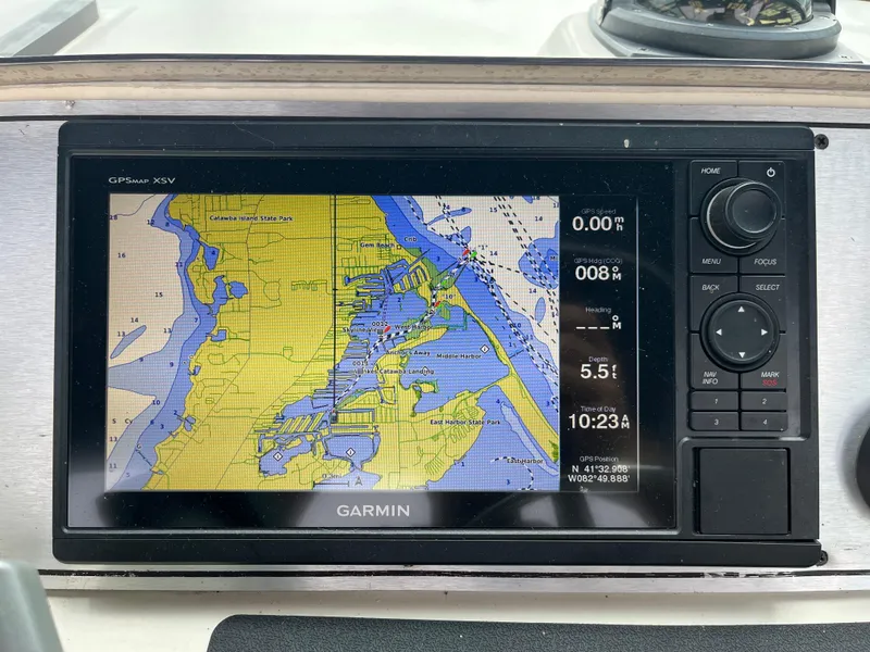 Slide: The Image of Garmin GPS display on 1986 Tiara Yachts Continental, showing nautical map and navigation data. - 10