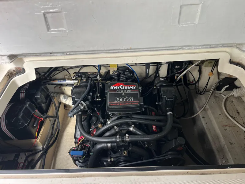 Slide: The Image of 1986 Tiara Yachts Continental engine compartment with MerCruiser 260 V8 engine. - 21