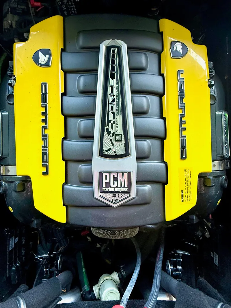 Slide: The Image of 2017 Centurion Ri237 engine with PCM marine branding and yellow accents. - 14