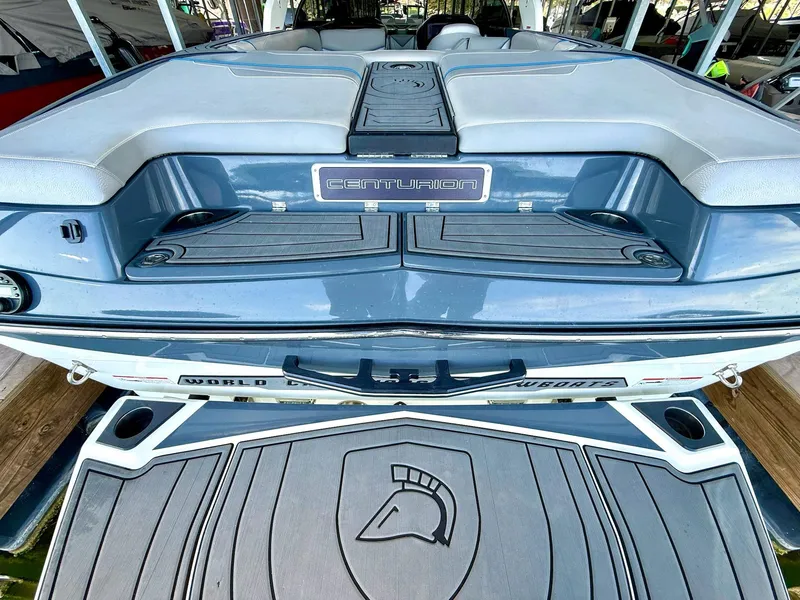 Slide: The Image of 2017 Centurion Ri237 boat rear view with logo and seating area. - 32