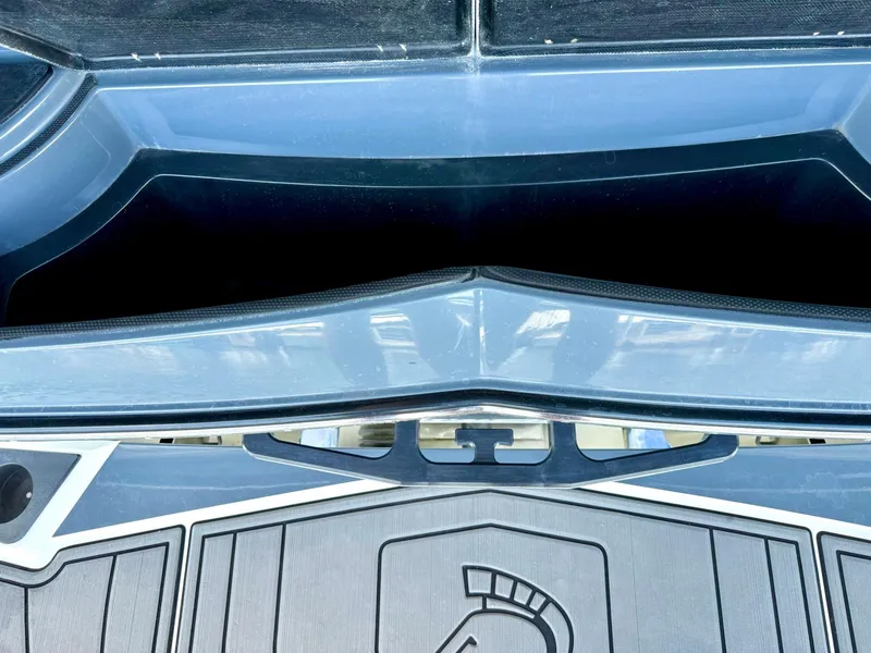 Slide: The Image of 2017 Centurion Ri237 boat interior with sleek design and storage compartment. - 35