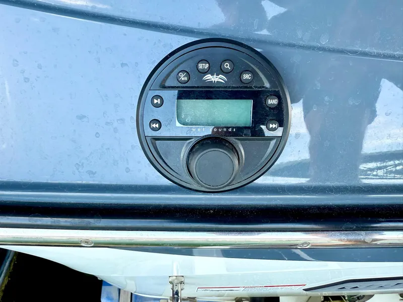 Slide: The Image of Control panel on a 2017 Centurion Ri237 boat dashboard. - 42