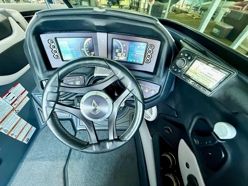 Slide: The Image of 2017 Centurion Ri237 dashboard with steering wheel, digital displays, and control panel. - 48
