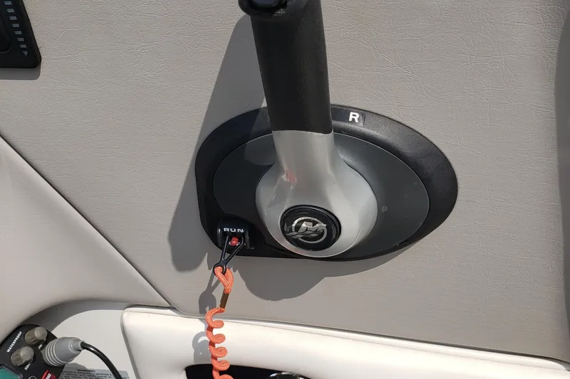 Slide: The Image of 2006 Ebbtide 2300 BRL boat on trailer in storage facility. - 3