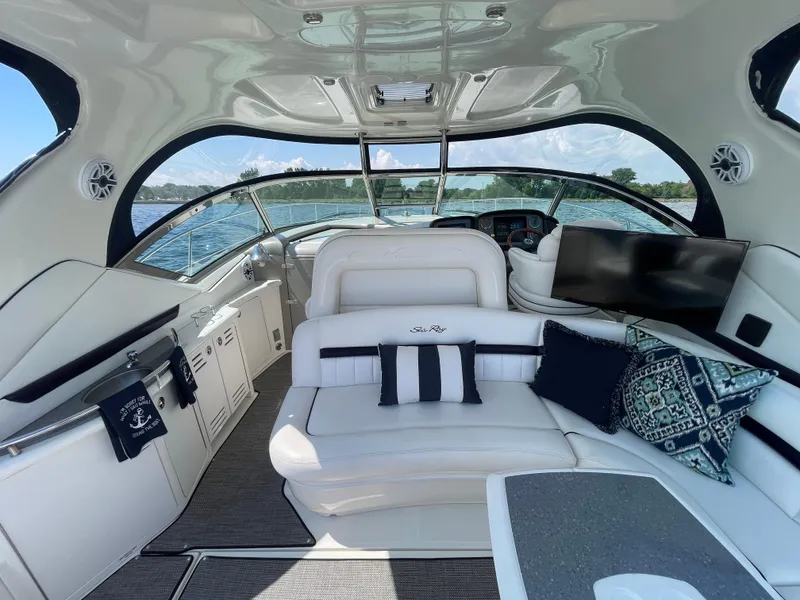 Slide: The Image of Luxurious interior of 2006 Sea Ray 44 Sundancer yacht with plush seating and elegant design. - 25
