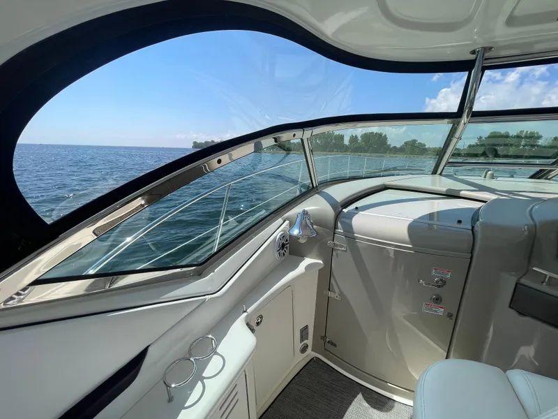 Slide: The Image of Interior view of 2006 Sea Ray 44 Sundancer yacht with ocean and sky backdrop. - 30