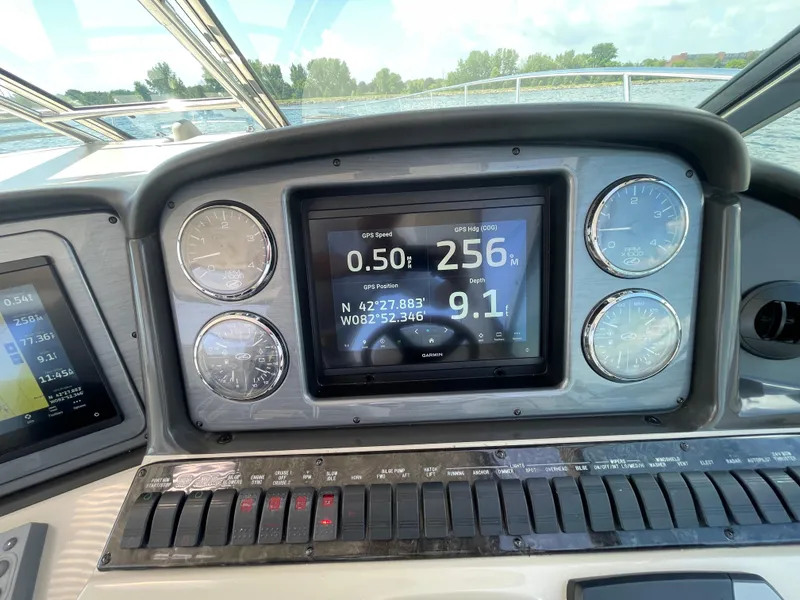 Slide: The Image of Control panel of a 2006 Sea Ray 44 Sundancer boat with GPS display. - 37