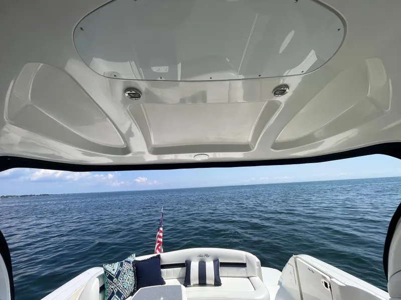 Slide: The Image of 2006 Sea Ray 44 Sundancer yacht interior with ocean view and comfortable seating. - 41
