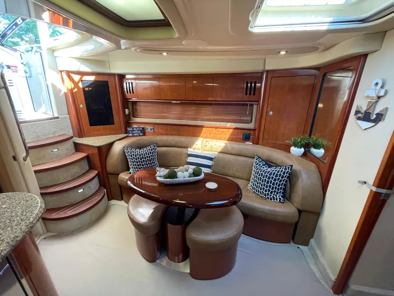 Slide: The Image of Luxurious interior of 2006 Sea Ray 44 Sundancer yacht with elegant seating and decor. - 43