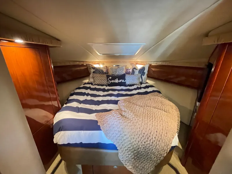 Slide: The Image of Luxurious cabin interior of 2006 Sea Ray 44 Sundancer yacht with cozy bedding. - 49