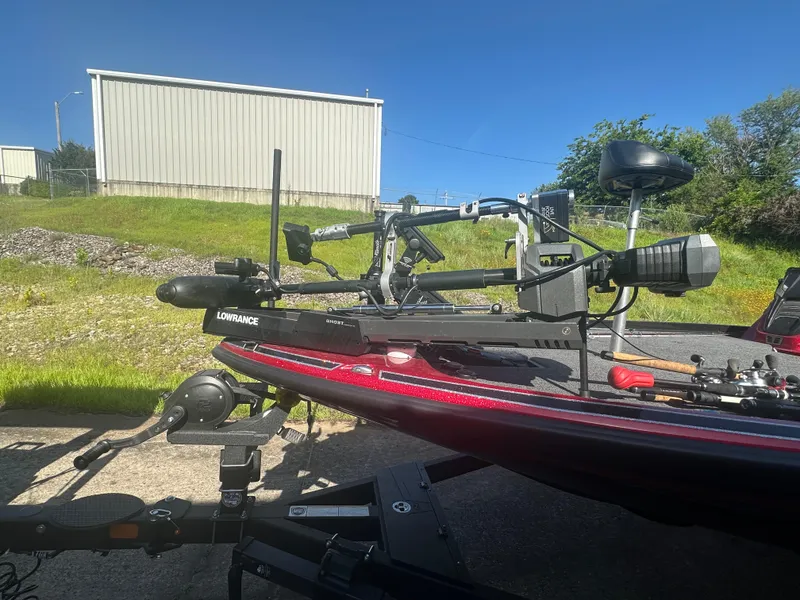 Slide: The Image of 2024 Nitro Z21XL boat with Lowrance equipment on a sunny day. - 7