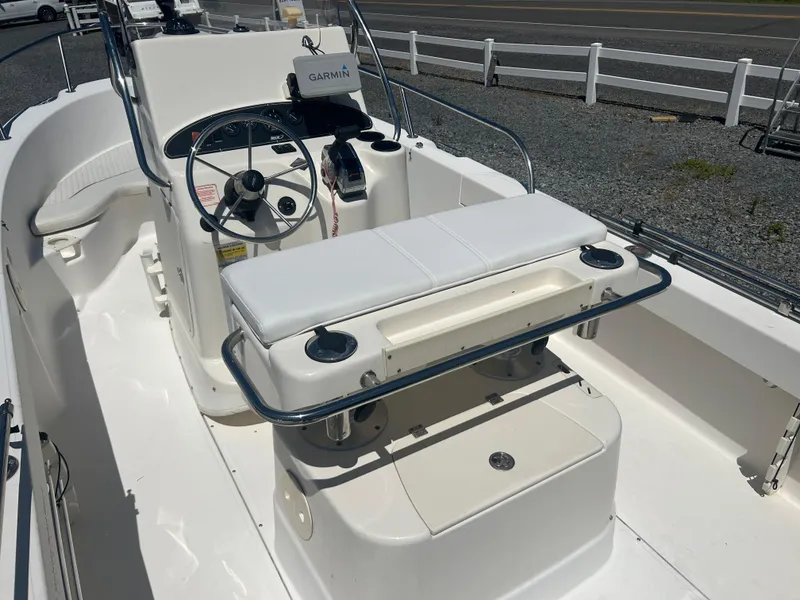 Slide: The Image of 2004 Boston Whaler 190 Nantucket boat interior with Garmin navigation system. - 3