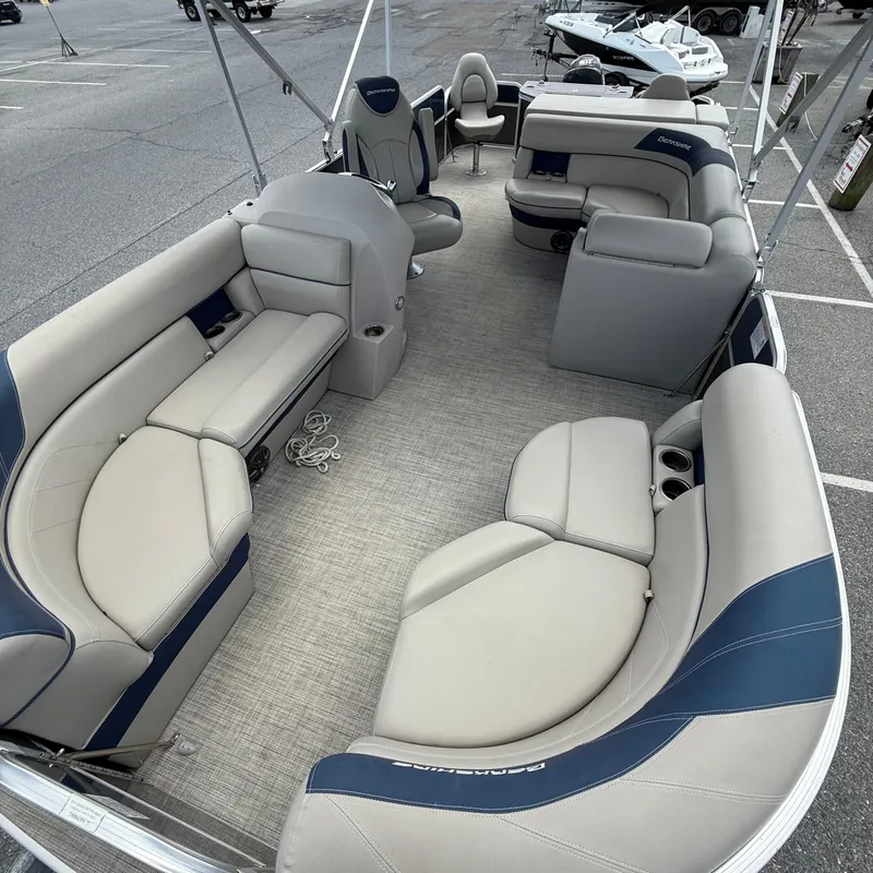 Slide: The Image of 2022 Berkshire 24RFC LE 2.75 pontoon boat with spacious seating and modern design. - 8