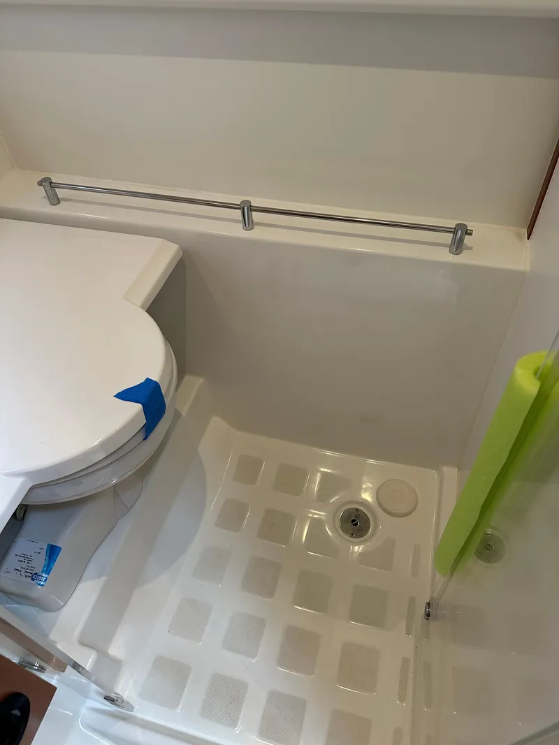 Slide: The Image of Bathroom of 2016 Jeanneau Leader 36 yacht with toilet and shower area. - 45